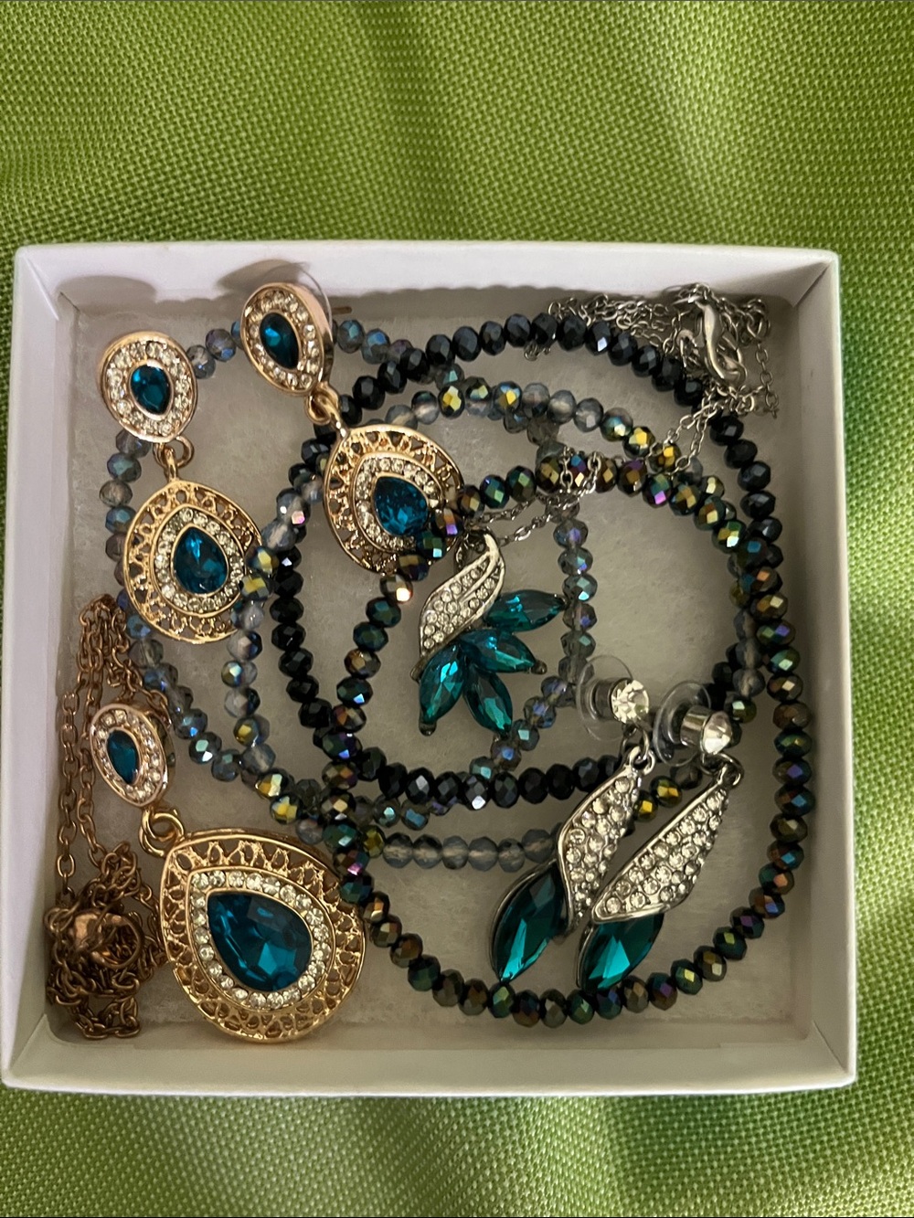 Necklace and earring collection with bengal bracelets